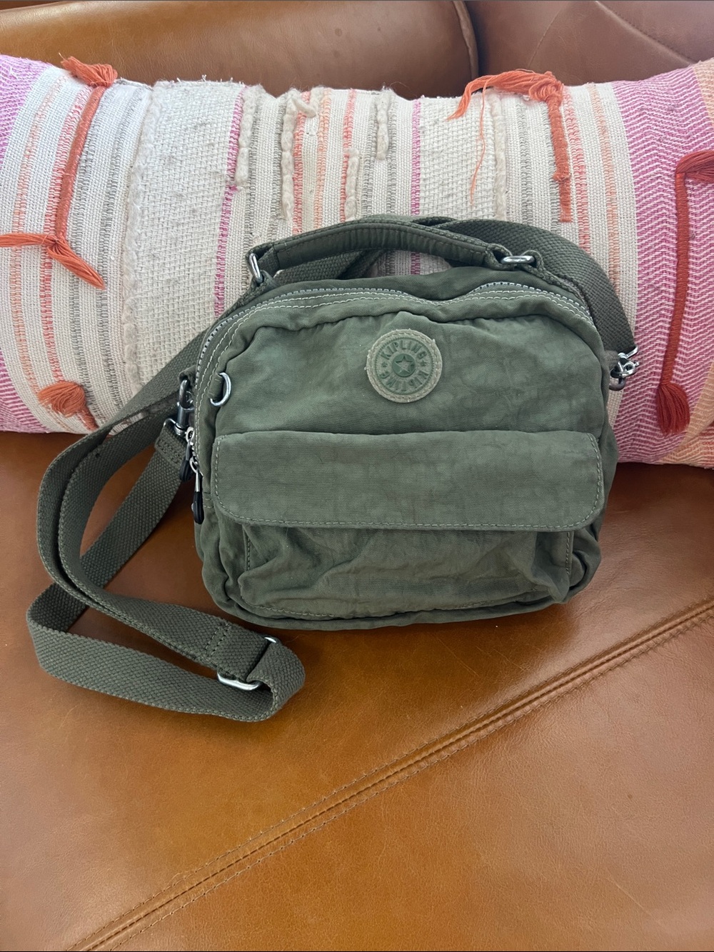 Kipling small multi pocket crossbody or hand held purse olive green